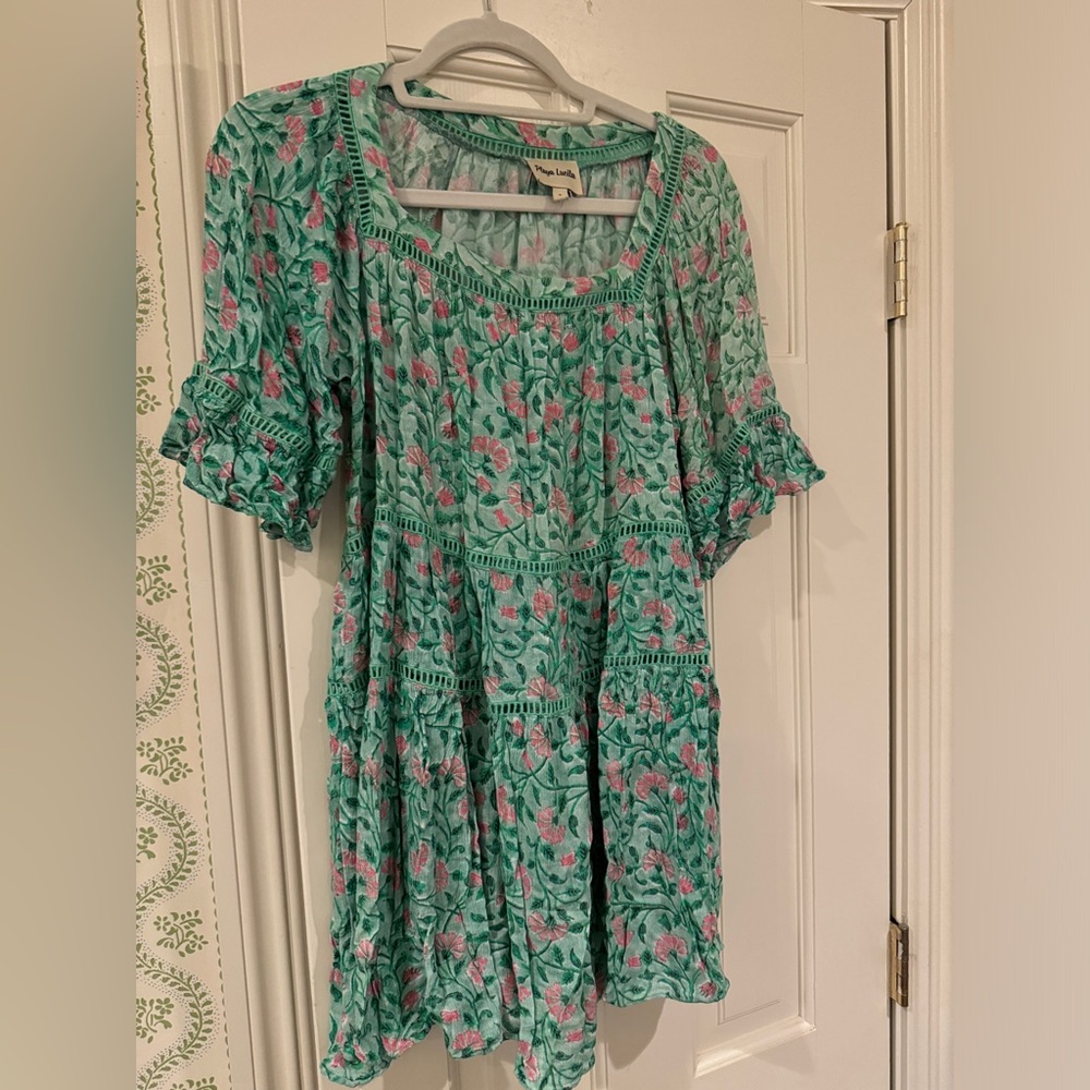 Green and pink floral beach cover up.